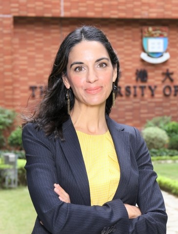 A photograph of a woman with dark hair. 