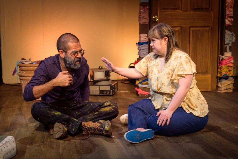Megan Michaels and Karim Chebli performing a scene.