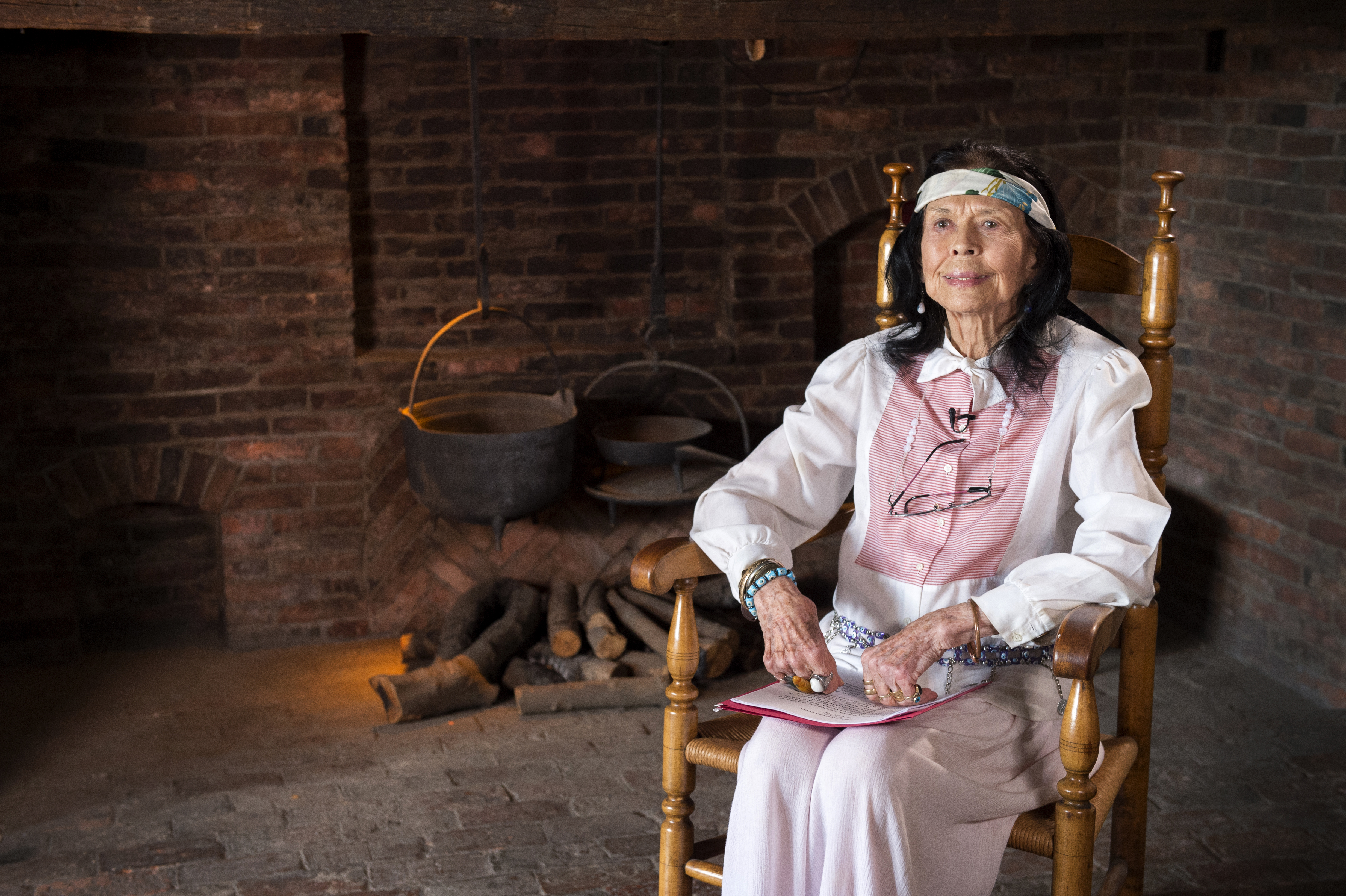 Maxine Bruhns in a chair